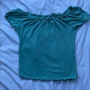 green cropped top